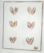 Mini hearts on canvas