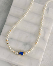 Kinley Necklace, pearl choker with blue and gold details