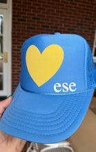 Happy Heart Trucker Hat: Kelly green + light blue