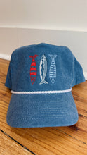 Sardine Trucker Hat: Tan hat | light blue green + blue thread